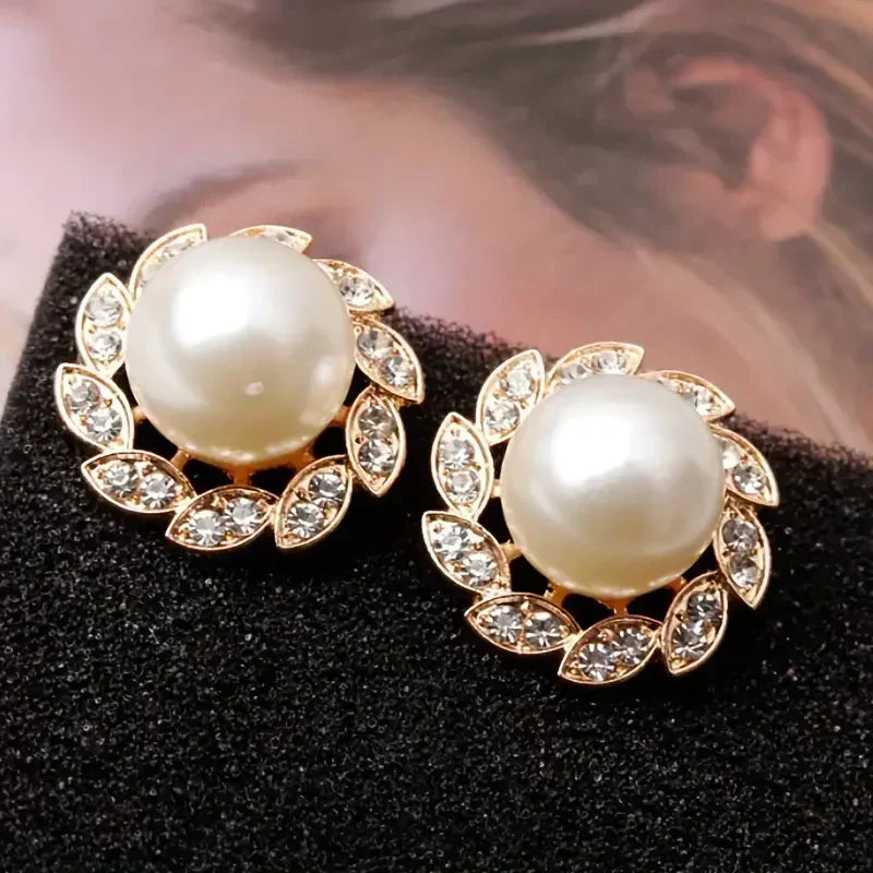 Pendientes de Perla Buscada y Hoja Brillante | Oro