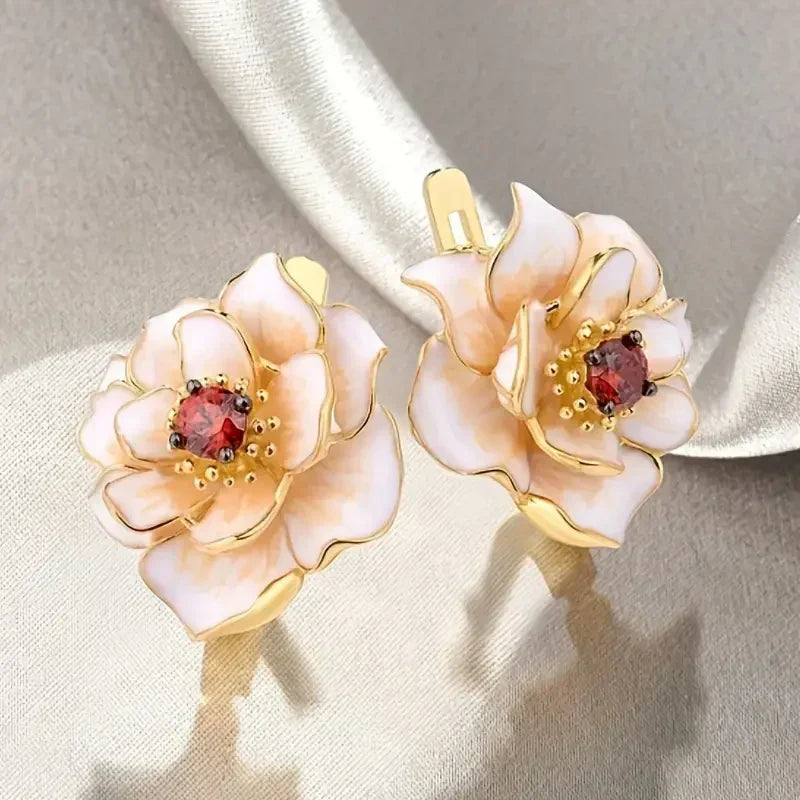 Pendientes de Circonitas Rojas con Flor Blanca | Oro