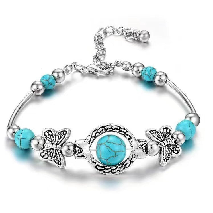 Pulsera Oasis Butterfly Drift | Oro blanco