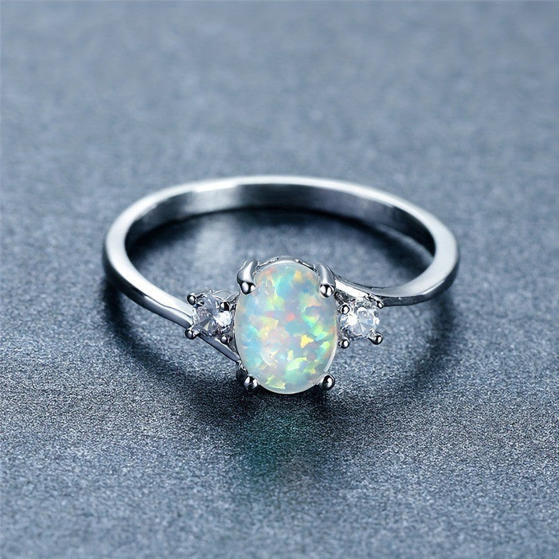 Anillo Opal Embrace | Oro Blanco