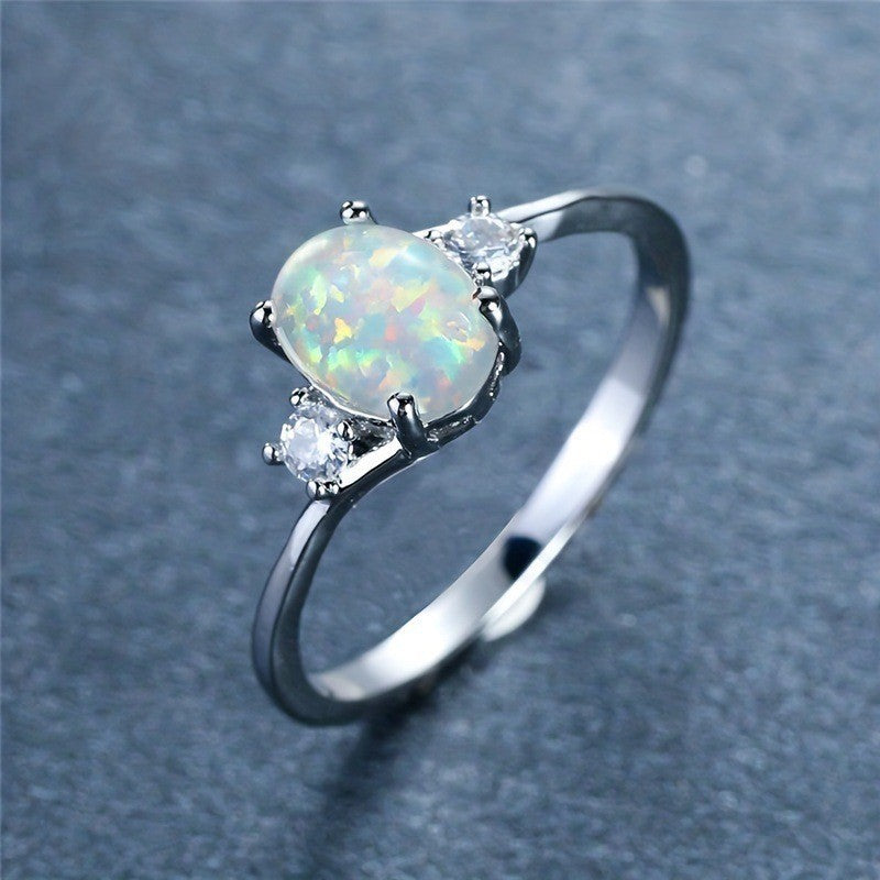 Anillo Opal Embrace | Oro Blanco